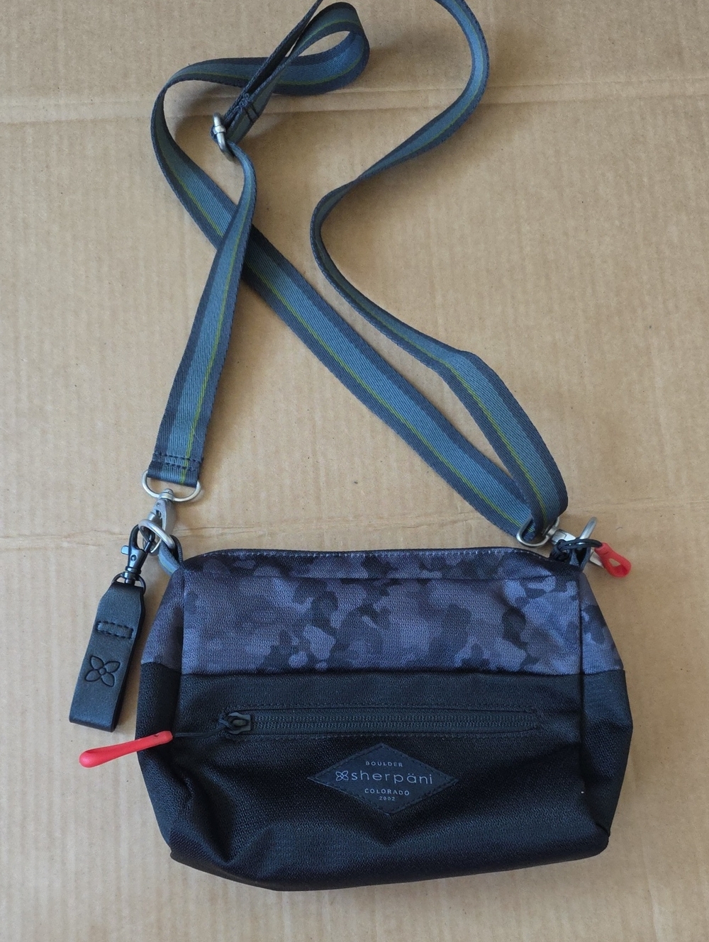 Sherpani black/camouflage Skye crossbody bag